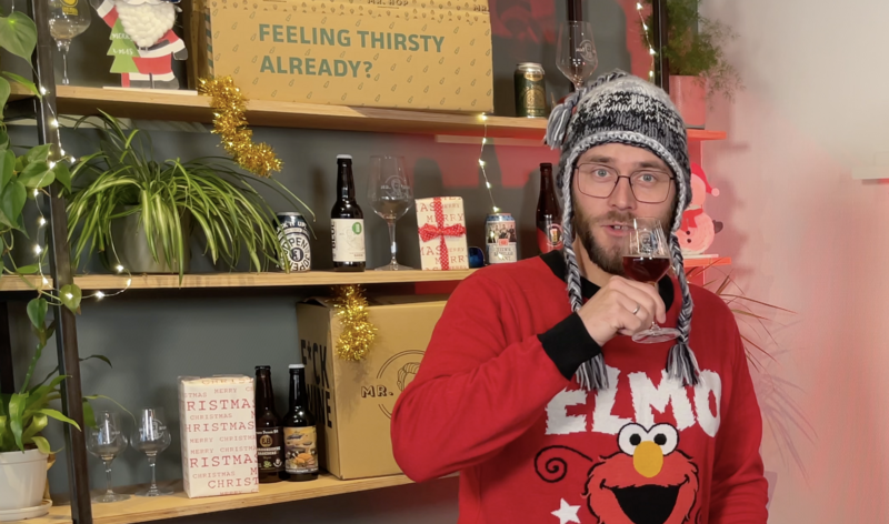 Bierverkoster und Liebhaber von Weihnachtspullovern